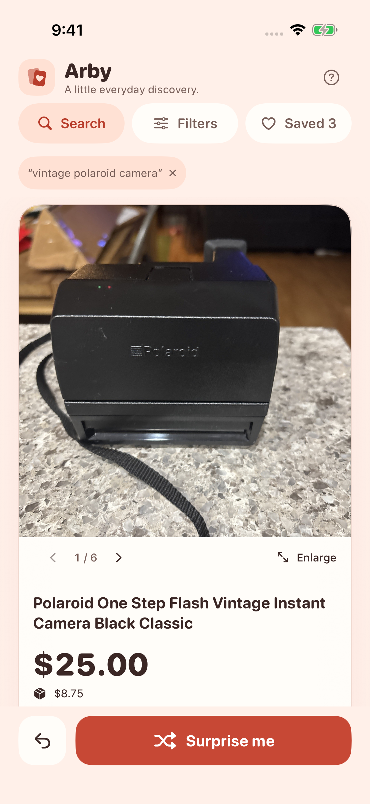 Arby on iPhone: a large Polaroid camera photo, rounded search and filter controls, and a coral Surprise me button